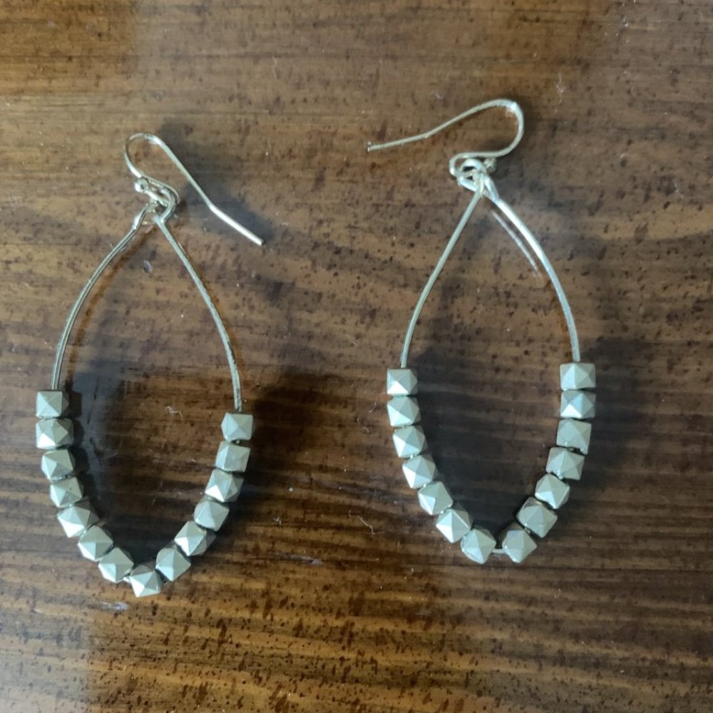 Gold colored earrings